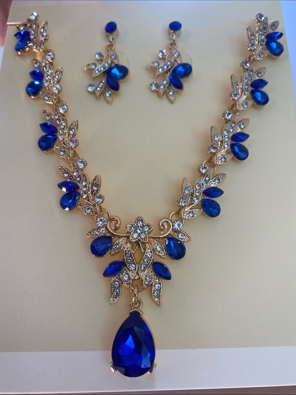 Blue rhinestone necklace and earrings